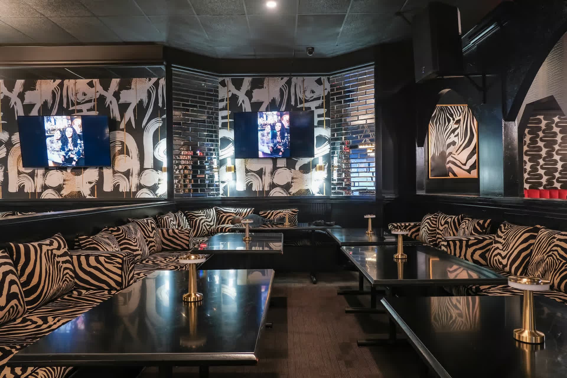VIP zebra-print booth at Pizookah Lounge