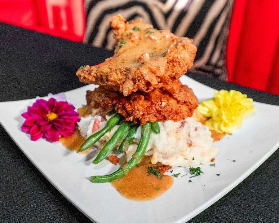 Smothered Pork Chop Dinner at Pizookah Lounge in Kennesaw, GA